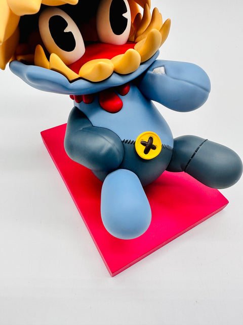 RedGuardian Knav Laughing at You limited edition hand-painted resin figure with blue body, yellow button, and red platform.