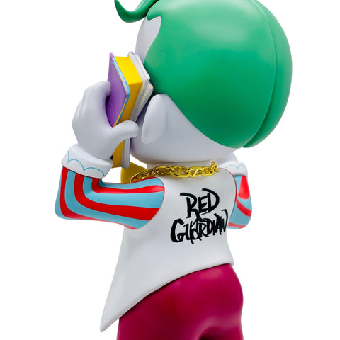 RedGuardian vinyl figure with green hair, holding a stack of money to ear, wearing red and blue striped sleeves and red shorts, with a gold chain.