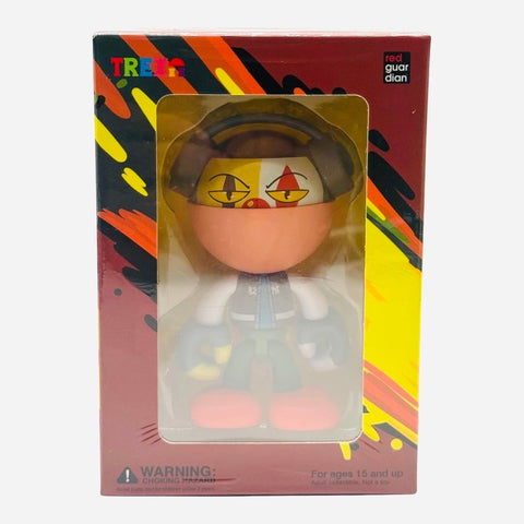 RedGuardian x Trexii collaboration vinyl toy featuring a clown-like character with yellow, red, and white face paint, orange nose, and red shoes.