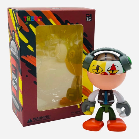 RedGuardian x Trexii collaboration vinyl toy, 'Payaso', 3-inch figure with headphones, green pants, and orange shoes.