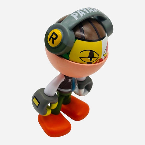 RedGuardian x Trexii Payaso vinyl toy with headphones, orange feet, and colorful face.