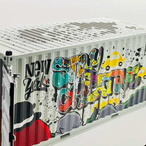 RedGuardian x Martian Toys "Can’t Contain Us" 1:20 scale vinyl shipping container with graffiti art, New York text, and yellow car.
