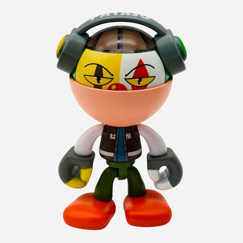 RedGuardian x Trexii Payaso vinyl toy, 3-inch, featuring a half-face design with clown-like makeup and headphones.